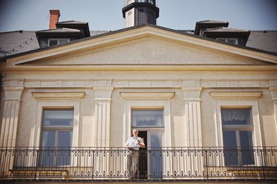 Father of bride on balcony