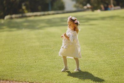 Flower girl runs to position