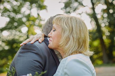 Groom embraces his mother