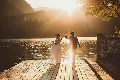 Newlyweds Celebrating in the Golden Light, Lake Bled