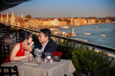 Caress for his lady at the rooftop terrace at the Hotel Danieli