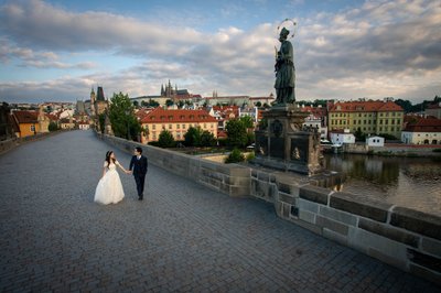 Korean Newlyweds Walking Across Empty Charles Bridge