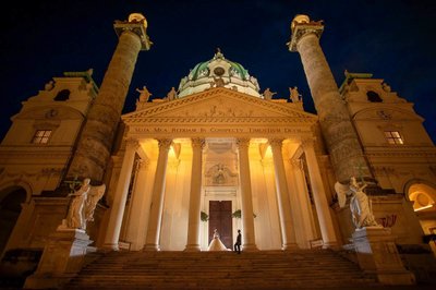 The gorgeous newlyweds posing at the Karlskirche