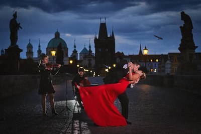 Prague Charles Bridge Night Proposal Photo - Red Dress Kiss