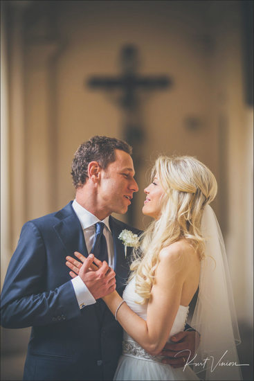 The groom serenades his bride at church