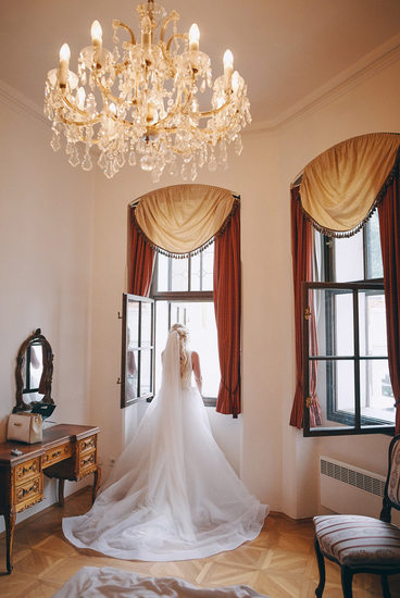 The bride Anna looking outside