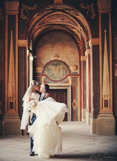 bride & groom kiss Ledebour Garden wedding photo