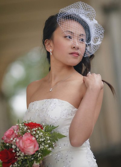 Stylish NYC bride wearing the birdcage veil