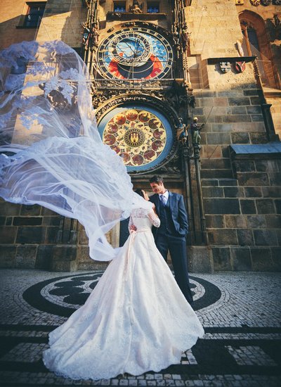 bride & groom underneath the Astronomical Clock