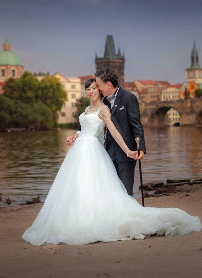 Iconic Riverside and Charles Bridge Couples Photo