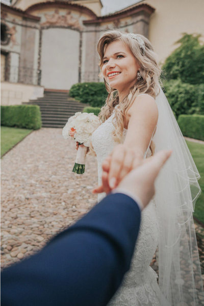 Taking the groom's hand