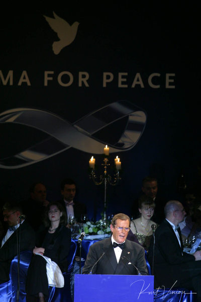 Roger Moore presents during the 'Cinema For Peace' gala