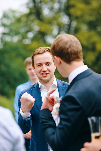 Groom celebrates with friends