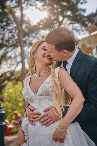 The radiant bride smiles at her groom