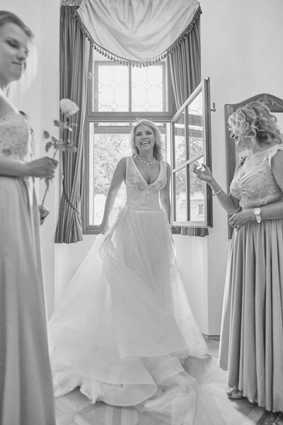 Excited Bride with mother and sisters