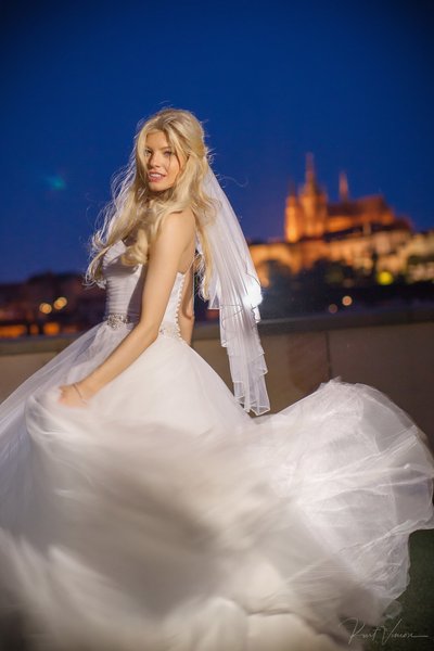 Twirling bride atop the Four Seasons Hotel in Prague