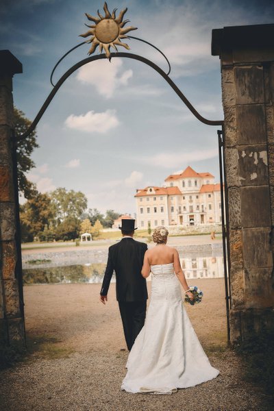 stylish groom and bride at the Chateau Liblice
