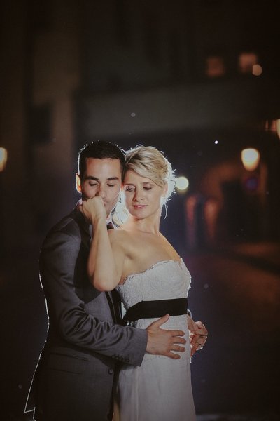 Kissing his bride's hands 