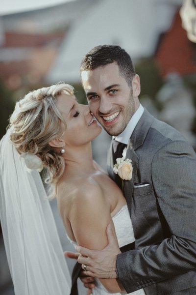 New Zealand bride kisses her groom