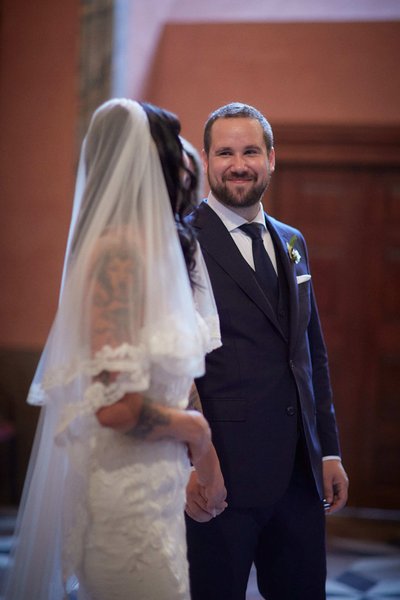 smiling groom ceremony