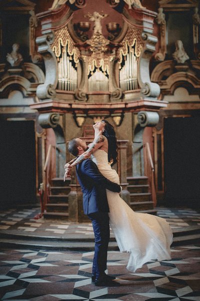 spinning his bride near the alter