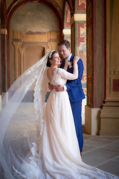 Happy Bridge held tight by the groom at the Ledebour Garden