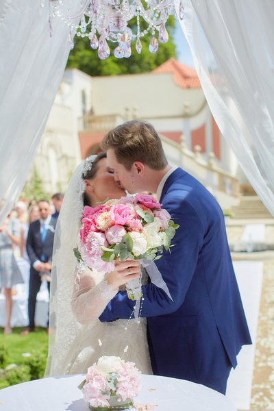 Newlyweds Kiss as Husband and Wife at the Ledebour Garden 