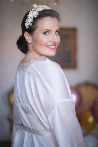 The beaming bride at the Hotel Constance in Prague