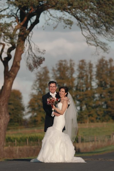 Newlyweds Enjoying A Countryside Irish Wedding