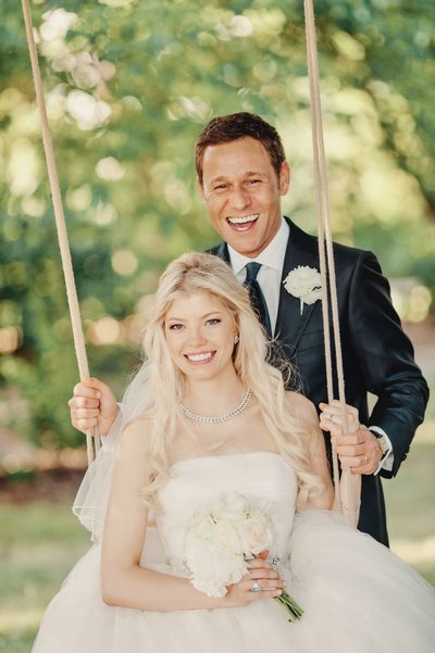 Gorgeous Newlyweds on swing Prague