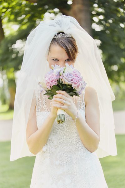 Happy Bride Smelling Bouquet