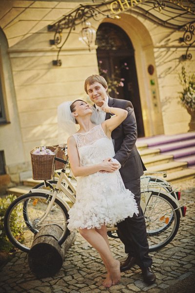 Happy Newlyweds near bikes