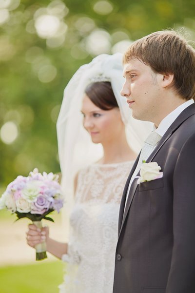 Groom listens intently