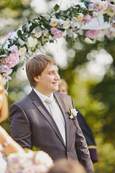 Smiling Groom Sees Bride