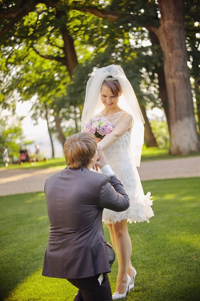 Groom Kissing Bride's Hand