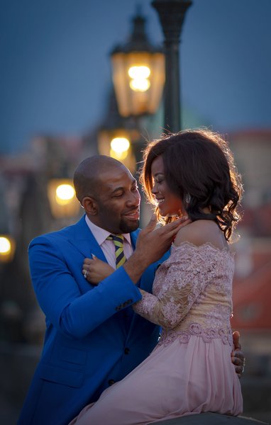 Sexy Stylish Nigerian couple enjoying Charles Bridge at night