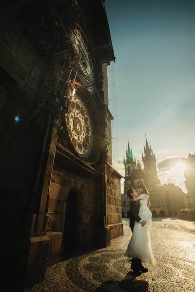 Korean Newlyweds Embracing Underneath Prague Astronomical Clock