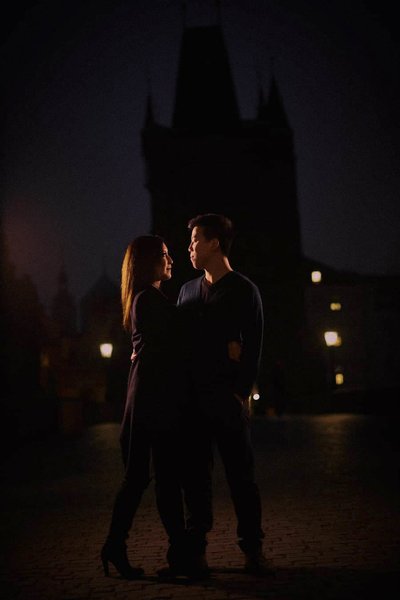 couple-silhouetted-gothic-tower