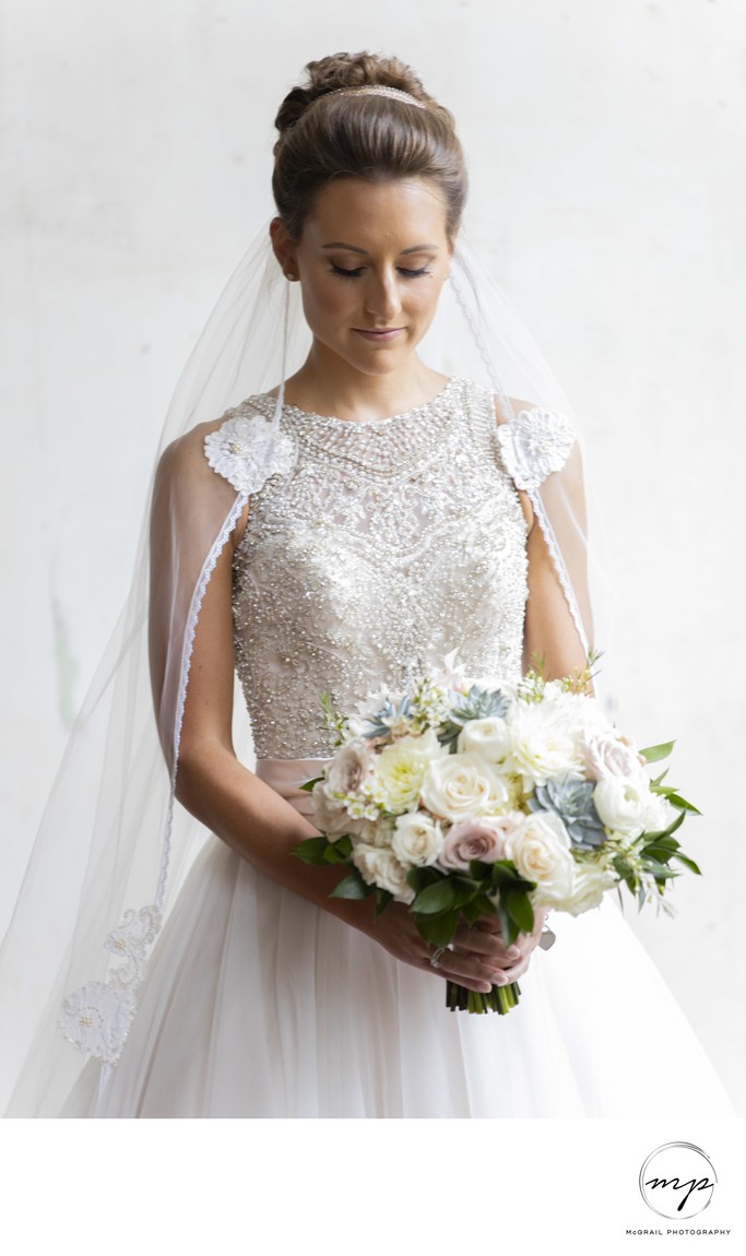 Elegant Bride Holding Bridal Bouquet