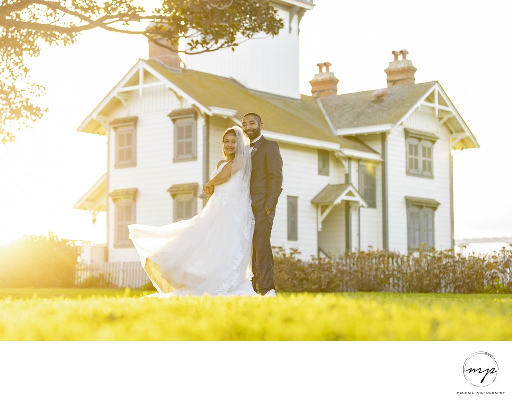 wedding portrait of couple at charming, rustic cottage