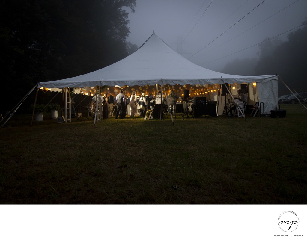 Elegant Wedding Reception in Tent on Foggy Night