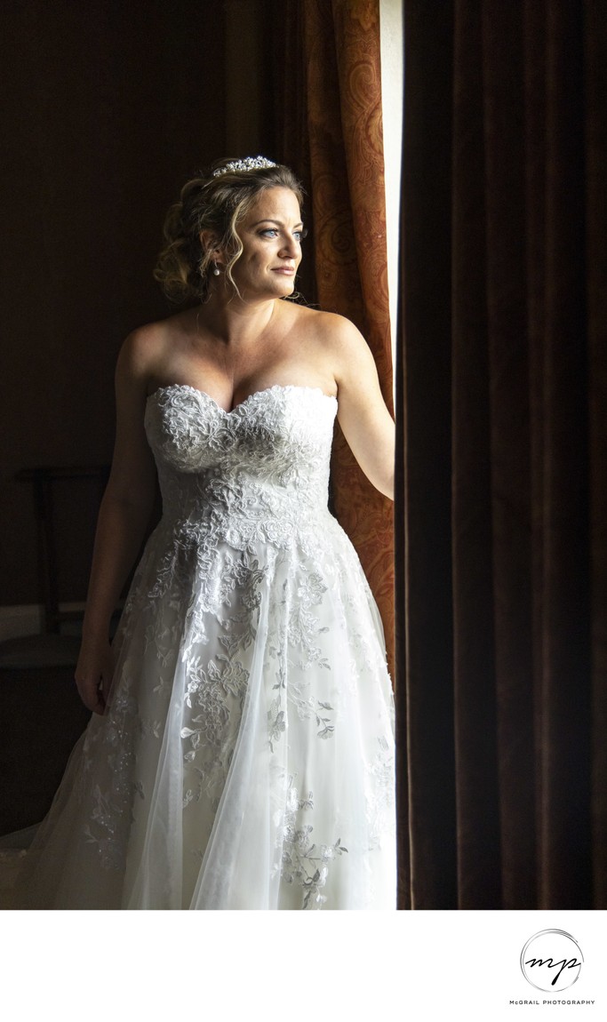bride in stunning lace ballgown