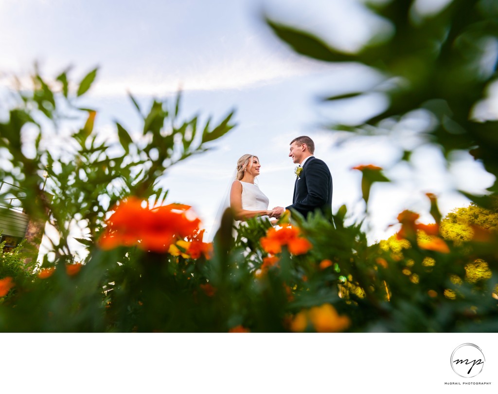 Bride and Groom Amidst Vibrant Blooms