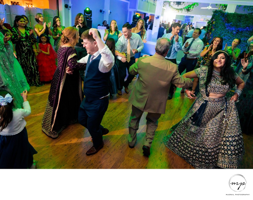 Joyful Wedding Dance: Cultures Unite on the Dance Floor