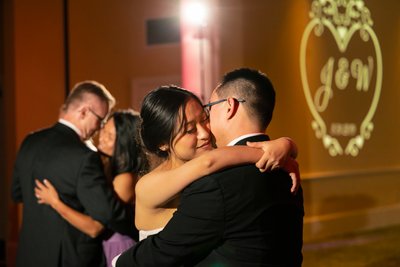 Couple Sharing Intimate First Dance at Wedding Reception