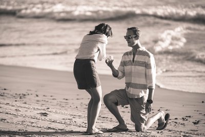 surprise beach proposal by the waves