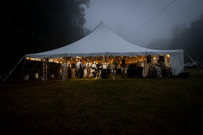 Elegant Wedding Reception in Tent on Foggy Night