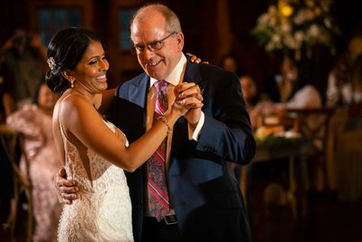 wedding photography of bride and father dance