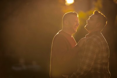 sunny engagement shoot of gay couple