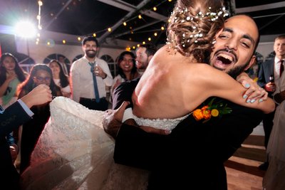 fun picture of ecstatic couple embracing 